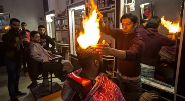 Barber sued for burning customer's forehead